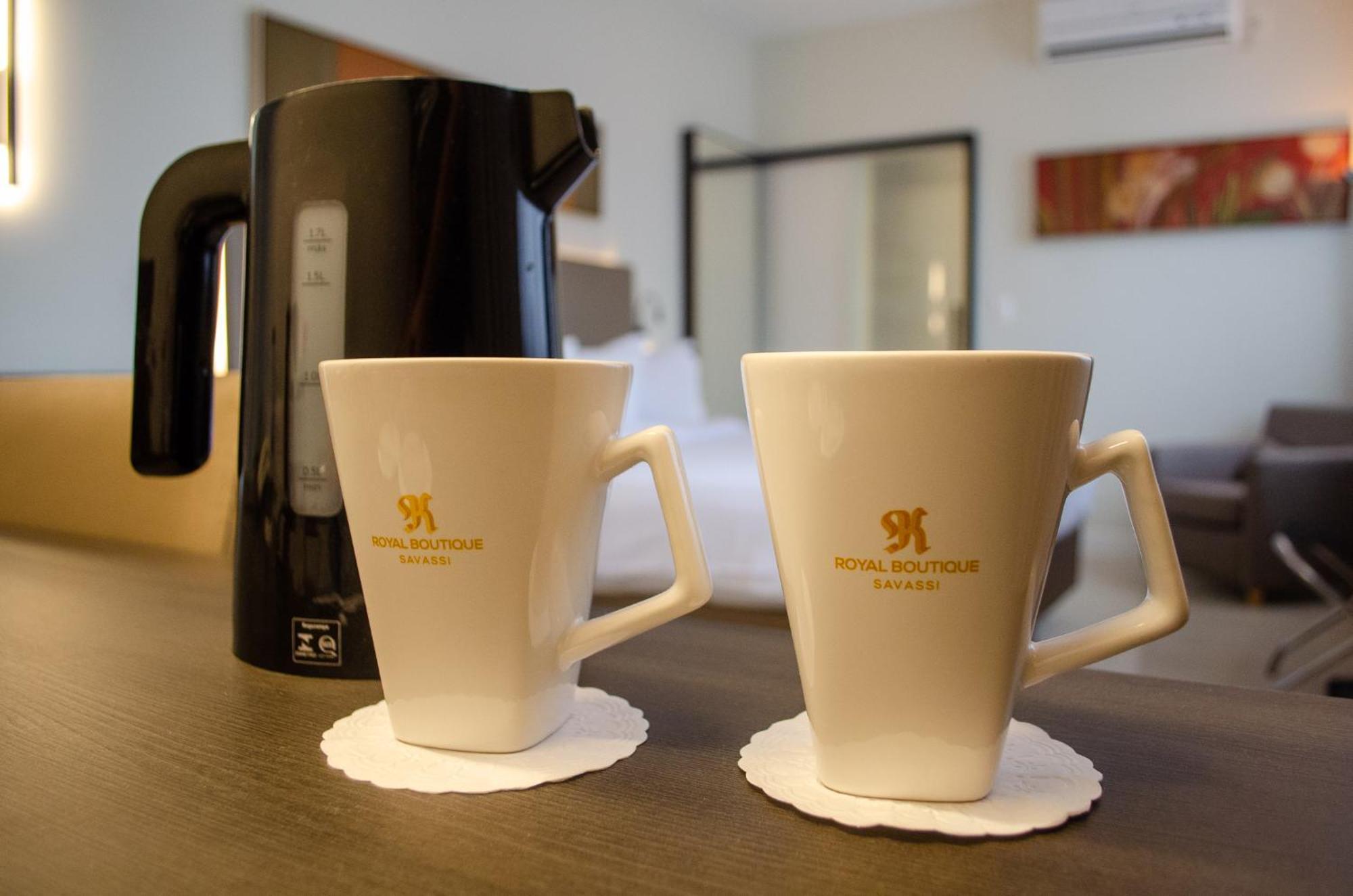 Royal Boutique Savassi Hotel Belo Horizonte Eksteriør billede A kettle and two cups
